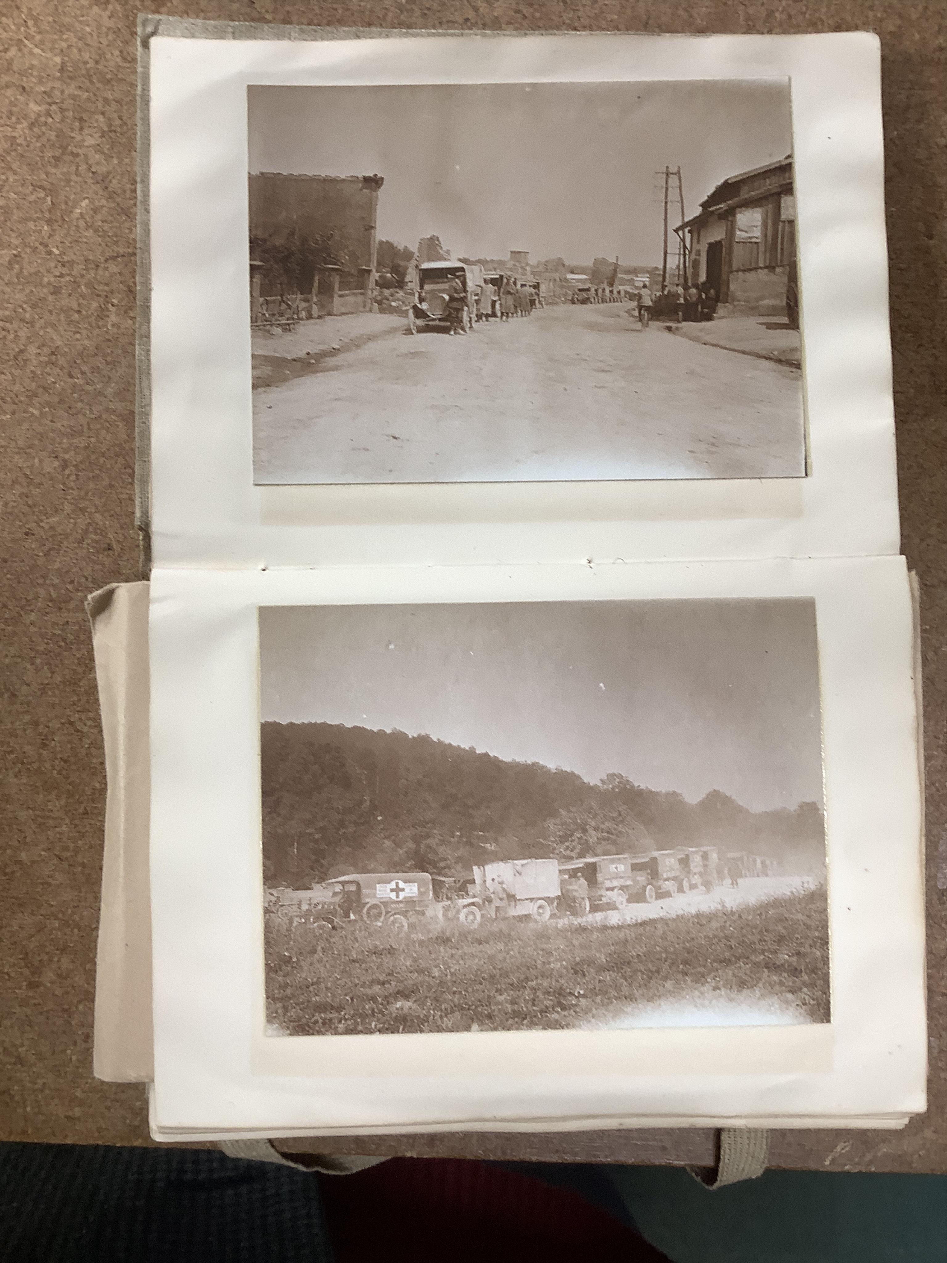 A WWI Ambulance and Balloon Brigade photograph album, pocket watch, coin, etc. Condition - fair, pocket watch ticks when wound